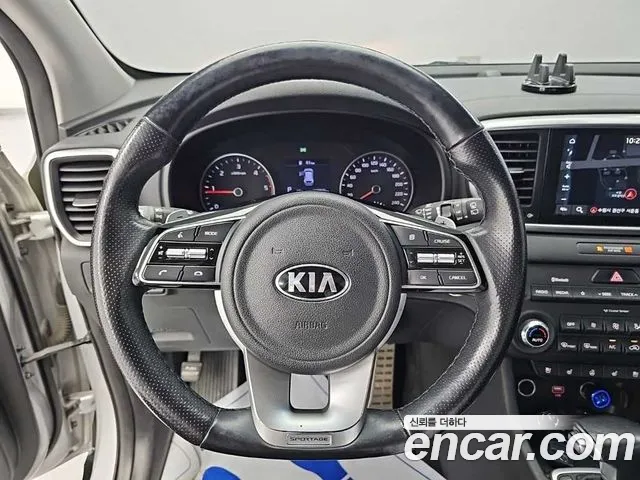 Kia Sportage — фото 9