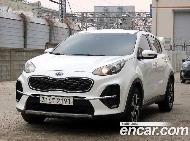 Kia Sportage — фото 1