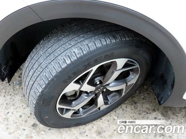 Kia Sportage — фото 17