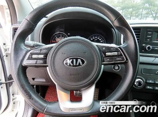 Kia Sportage — фото 8