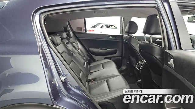 Kia Sportage — фото 11