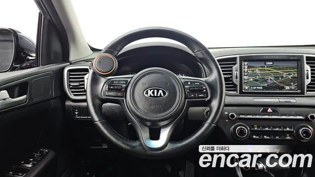 Kia Sportage — фото 13