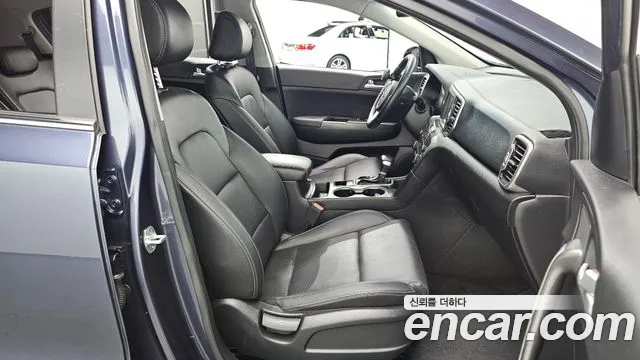 Kia Sportage — фото 10