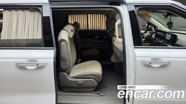 Kia Carnival — фото 11