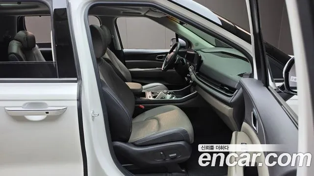 Kia Carnival — фото 12