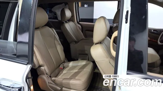 Kia Carnival — фото 11