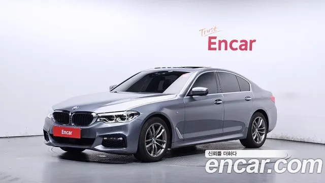 BMW 5-Series — фото 1