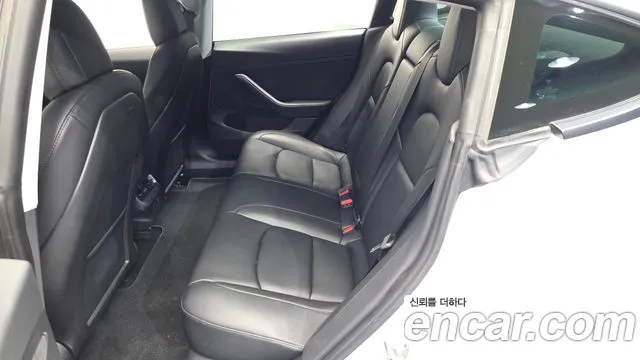 Tesla Model 3 — фото 11