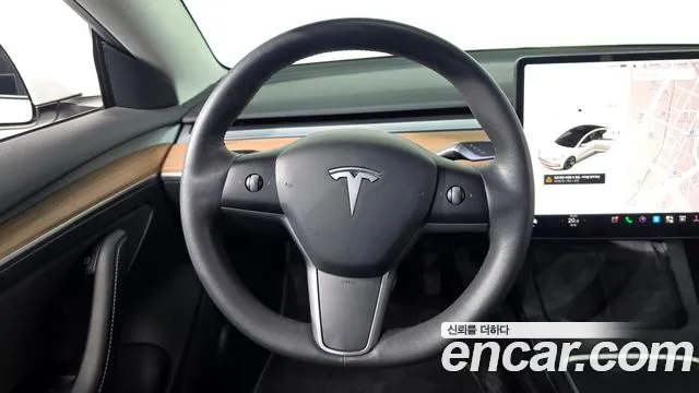 Tesla Model 3 — фото 13