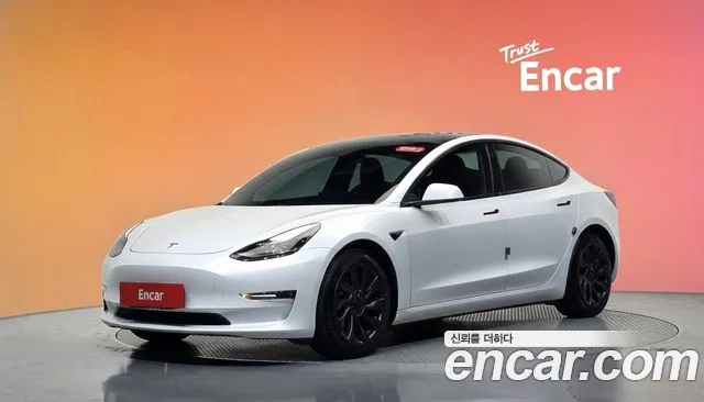 Tesla Model 3 — фото 20