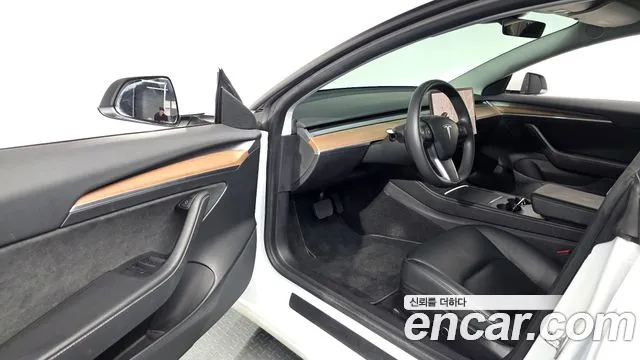 Tesla Model 3 — фото 10