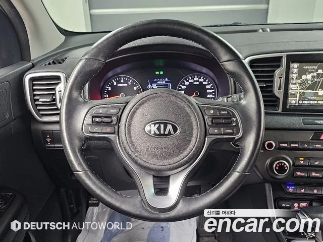 Kia Sportage — фото 13