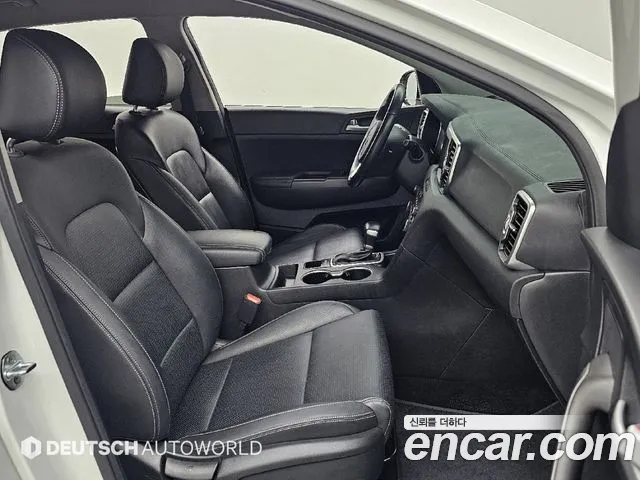 Kia Sportage — фото 10