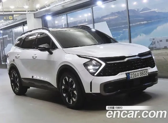 Kia Sportage — фото 1