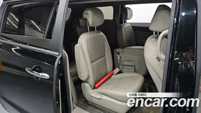 Kia Carnival — фото 11