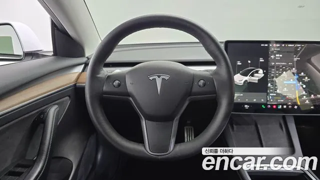 Tesla Model 3 — фото 12