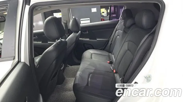 Kia Sportage — фото 11