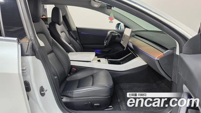 Tesla Model 3 — фото 11