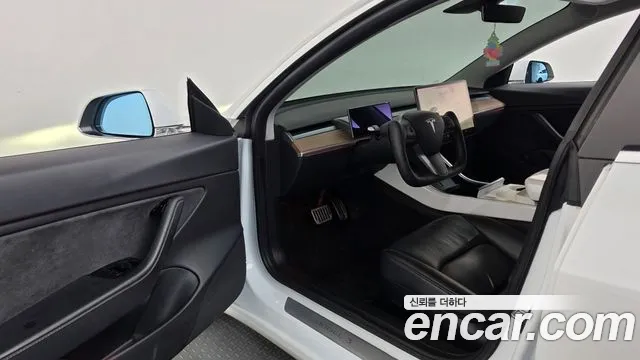 Tesla Model 3 — фото 10