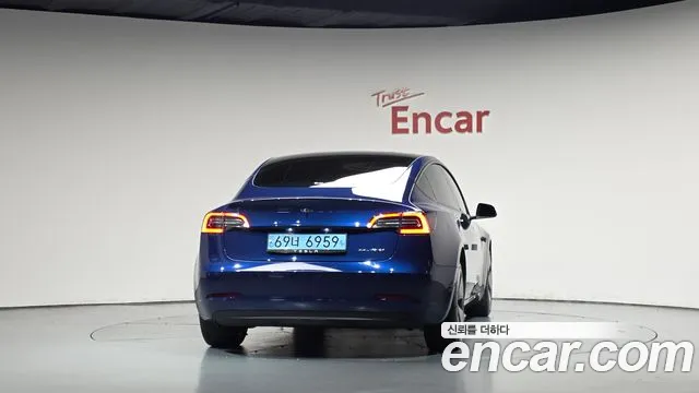 Tesla Model 3 — фото 3