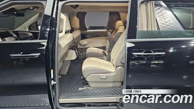 Kia Carnival — фото 11