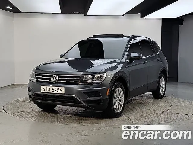 Volkswagen Tiguan — фото 1