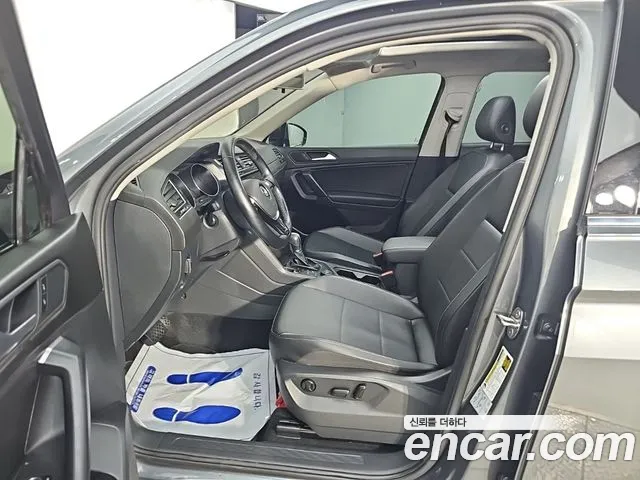 Volkswagen Tiguan — фото 11