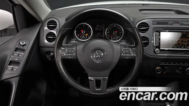 Volkswagen Tiguan — фото 13