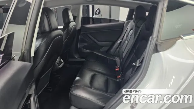 Tesla Model 3 — фото 11