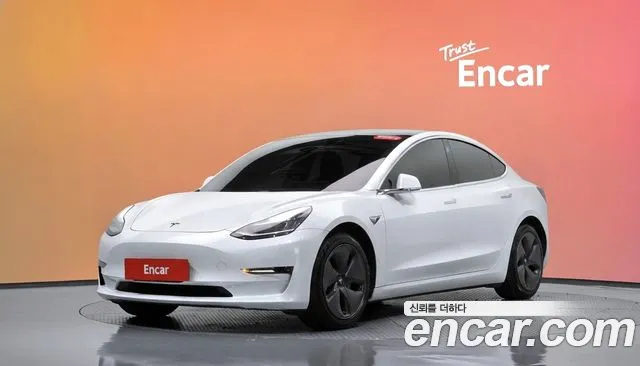 Tesla Model 3 — фото 20