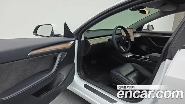 Tesla Model 3 — фото 10