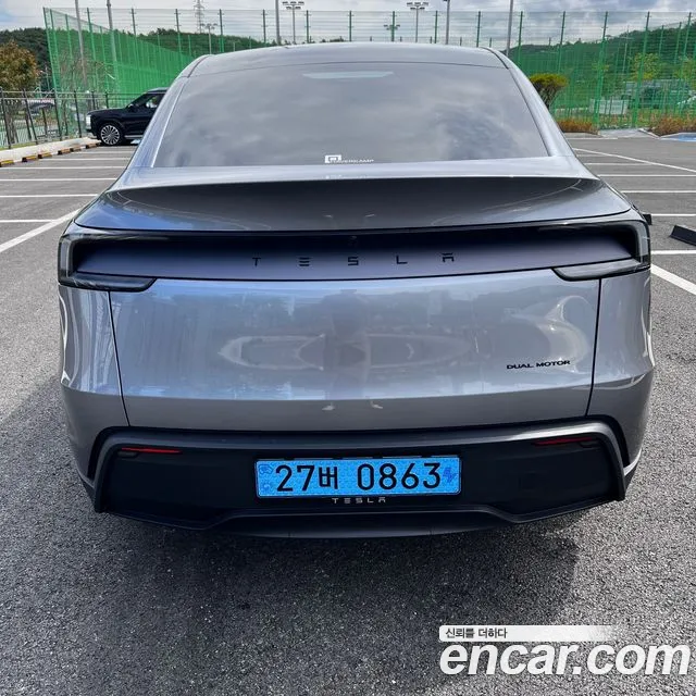 Tesla Model Y — фото 15