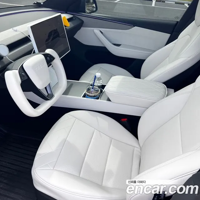 Tesla Model Y — фото 17