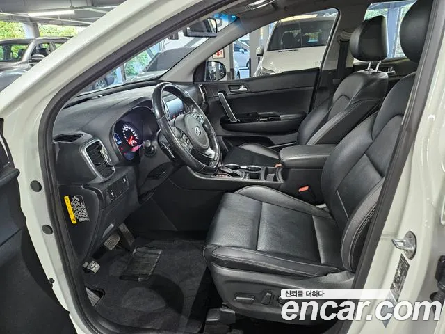 Kia Sportage — фото 6