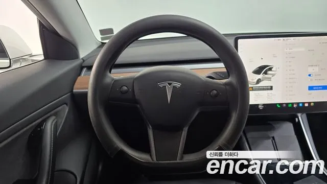 Tesla Model 3 — фото 14