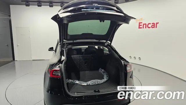 Tesla Model Y — фото 30