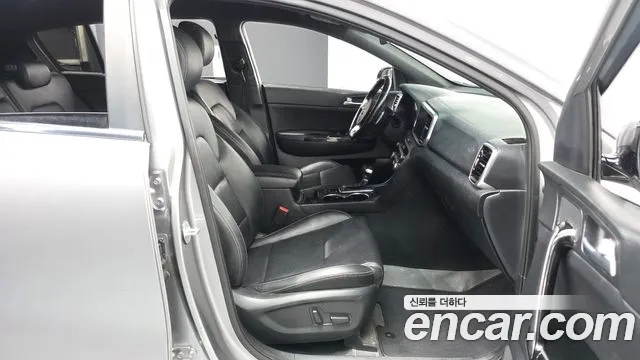 Kia Sportage — фото 11