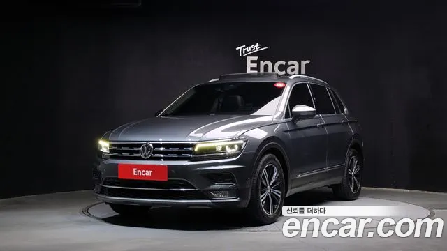 Volkswagen Tiguan — фото 1