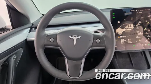 Tesla Model Y — фото 12