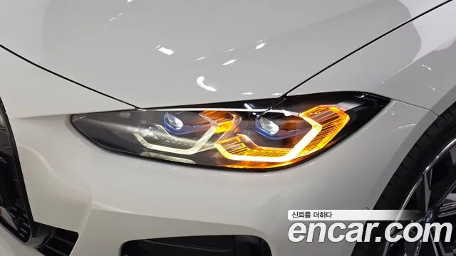 BMW i4 — фото 22