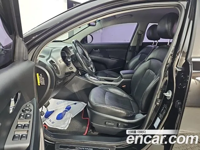 Kia Sportage — фото 11
