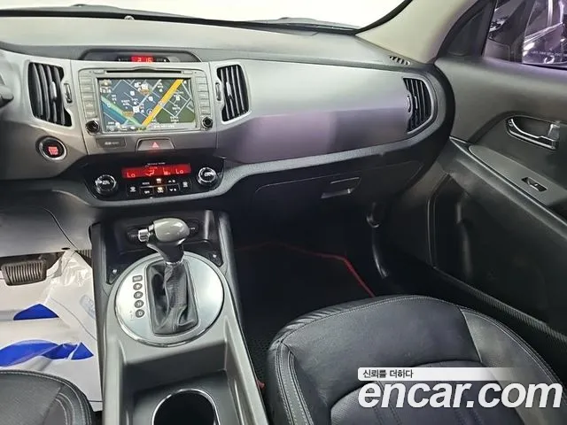 Kia Sportage — фото 10