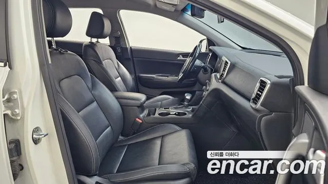 Kia Sportage — фото 11