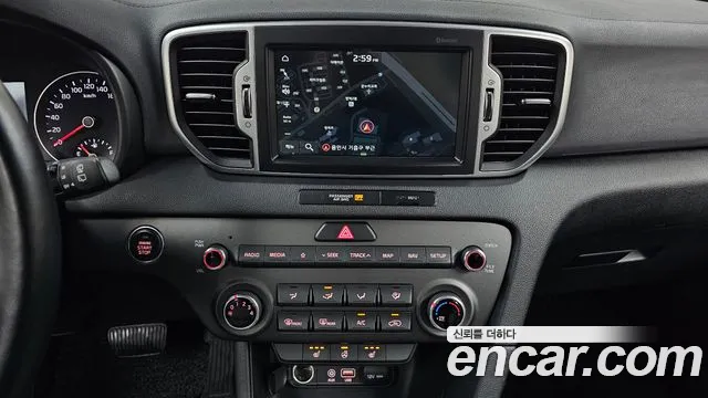 Kia Sportage — фото 11