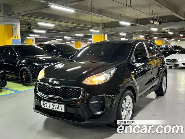 Kia Sportage — фото 1