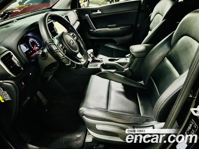 Kia Sportage — фото 11