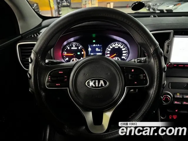 Kia Sportage — фото 8