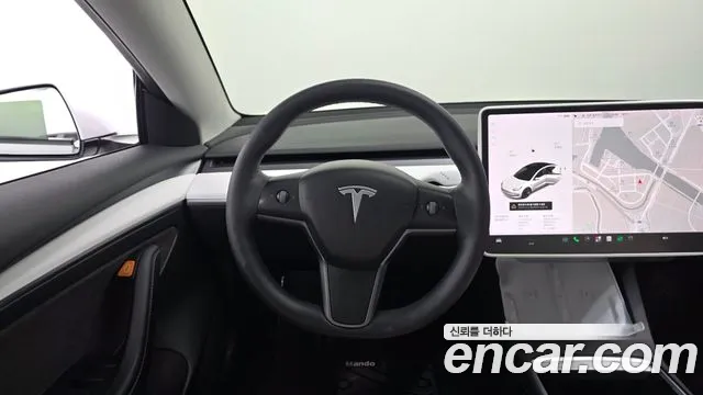 Tesla Model 3 — фото 11