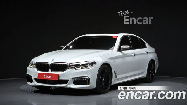 BMW 5-Series — фото 1