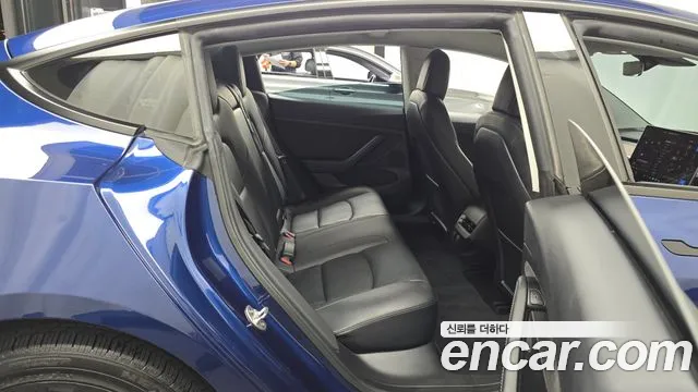 Tesla Model 3 — фото 11